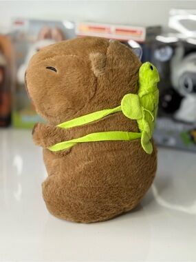 Plush Small Pet Brown Capybara Toy with Lime Green Turtle Backpack